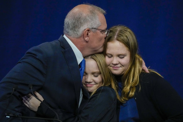 Scott Morrision with his two daughters Lily and Abbey.