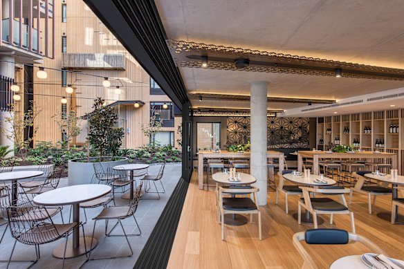 Onsite restaurant Storehouse shines in the evening.