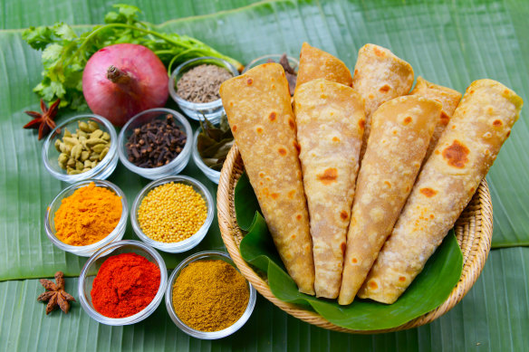 Sri Lankan spicy potato curry or aloo masala served with roti or chapati.