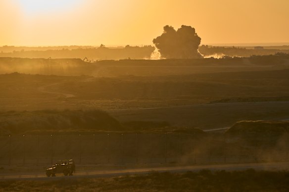An Israeli army vehicle moves along the Gaza border in southern Israel on Sunday.