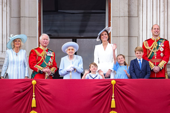 The British royal family on the balcony of Buckingham Palace watch the RAF flypast during the Trooping the Colour parade.