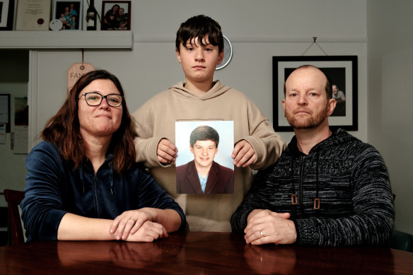 Lee-Ann, Aaron, 12, and Matthew Elmes with a photo of Josh.