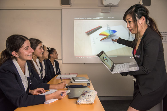 Maths teacher Ariel Fu engages her students at Meriden School.