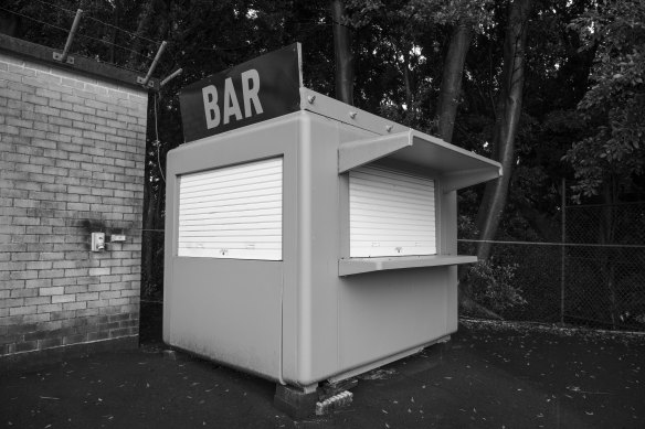 The bar at Leichhardt Oval is propped up by bricks and loose cement. 