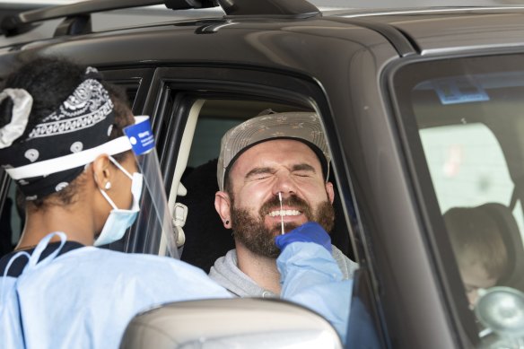 People being tested for COVID-19 in Perth on Monday. 