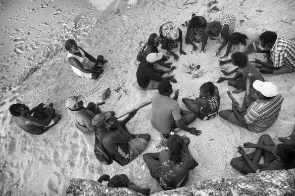 Liya Dhalinymirr community members in East Arnhem Land dancing the Hermit Crab dance for a SharingStories touch book about Mukarr, the Giant Green Sea Turtle.  