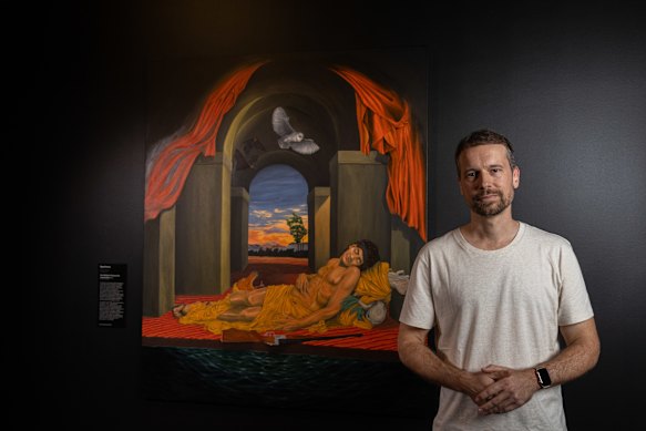 The 2026 Telstra Art Award winner Dr Ryan Presley with his painting Our Lifestyle of Tranquility Undisturbed. 
