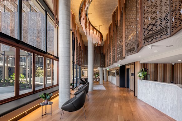 Vibe Hotel Adelaide’s double-storey foyer.