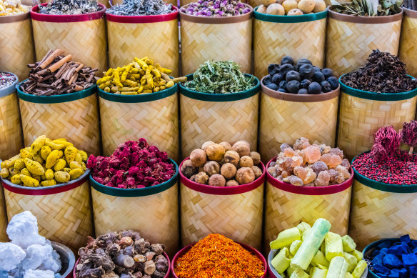 Spices in an Arab street market stall, Dubai Spice Souk.