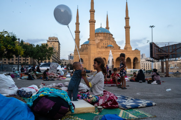 Children play in a makeshift camp in Martyrs’ Square, Beirut, where they are sheltering after being displaced by the ongoing conflict between Israel and Hezbollah.