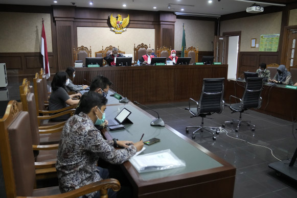 Central jakarta District Court judges read their verdict on a civil lawsuit filed against several Indonesian officials, including President Joko Widodo and Jakarta Governor Anies Baswedan, for their failure to improve poor air quality.