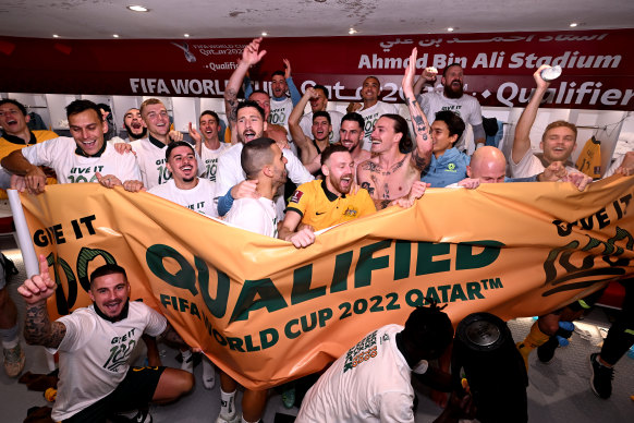 The jubilant scenes in the Socceroos’ dressing room.