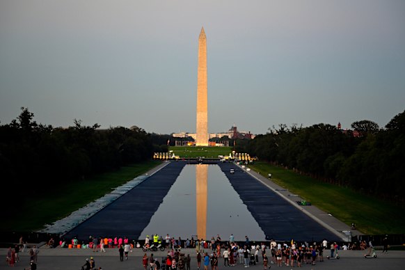 The Reflecting Pool is supposed to be a solemn place for visitors between the Washington Monument and Lincoln Memorial.