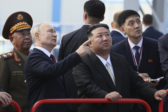 Putin and Kim examine a launch pad during their meeting at the Vostochny Cosmodrome.