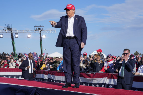 Trump gestures toward the crowd at the campaign rally in Ohio.