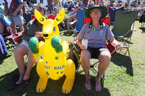 Supporters attend on day two of the third cricket test match between South Africa and Australia, in Cape Town.