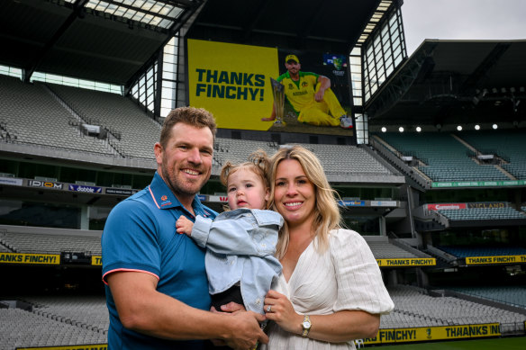 Aaron Finch with wife Amy and daughter Esther.