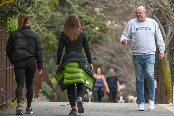 Billy Brownless strides out along the Tan among the activewear set.