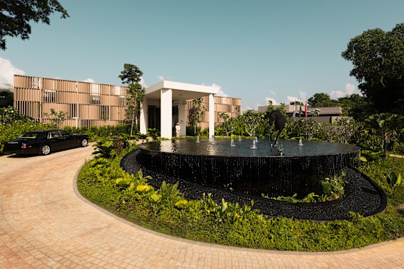 The curved driveway leading up to the entrance of Raffles Sentosa.