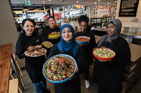 Khalida Rahim from Afghanistan (centre) with (back left to right), Iran-born Sara Soroush, Luisa Vitale from Samoa, Wesene Obese from Ethiopia and Ayan Ahmed from Somalia.