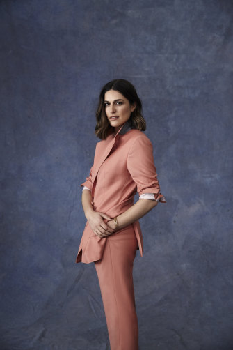 Sarah wears E Nolan suit, Arms of Eve jewellery. 