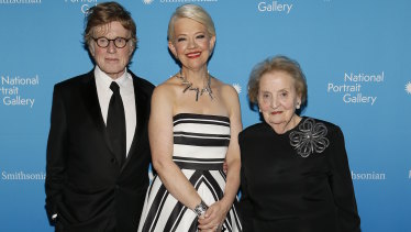 Kim Sajet (centre) fulfilled a childhood dream for former US Secretary of State Madeleine Albright (right) when she arranged for Robert Redford (left) to present her with a portrait prize.