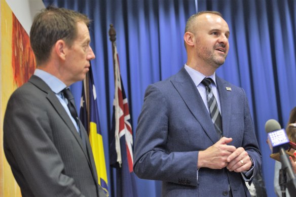 ACT Labor Chief Minister Andrew Barr and Greens Leader Shane Rattenbury discuss the parliamentary agreement on Thursday.
