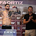 Michael Zerafa poses as Eddie Hearn looks on.