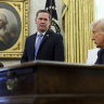 White House national security adviser Mike Waltz listens to President Donald Trump in the Oval Office on March 7.