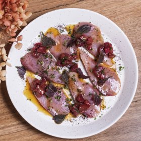 Bonito crudo with burnt honey and rhubarb.