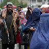 Taliban order Afghan women to cover up head to toe