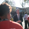 Chris Minns meets with teachers on the campaign trail in March.
