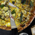 Zucchini Lamborghini pizza with ricotta, mint and everything bagel crumbs.