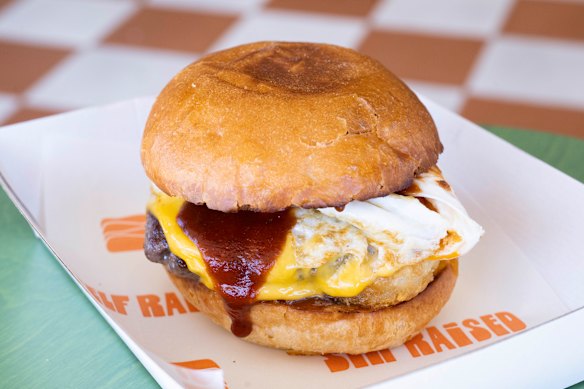 Egg, cheese and potato hash on a milk bun. 