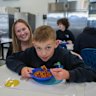 Rachel Cooke with son Christian at the Melton Specialist School lunch club.
