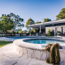 The refreshed pool area has a hot tub, sun loungers, a bar and pizza oven.