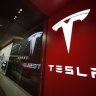 Tesla shows progress on profit as investors seek perfection