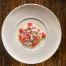 Hibachi-grilled pork jowl with preserved plum.