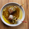 Torched kingfish skewered with gordal olives.
