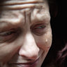 A woman, who is homeless and uses drugs, pictured at Hosier Lane.