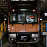 A train with a maintenance sign at Downer Rail Maintenance Centre in Auburn on Monday, October 17, 2022. Photo: Nikki Short/The Sydney Morning Herald