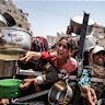 A charity distributes meals to Palestinians facing food shortages amid ongoing Israeli attacks and severe restrictions in Gaza on July 28.