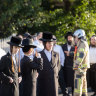 Congregants outside the synagogue on Friday morning.