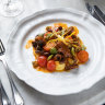 Baby octopus with red wine, tomato, olives and soft polenta.