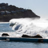 Waves crash into shore at Whale Beach in Sydney’s north on Sunday.