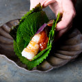 Aromatic leaves provide the wrapper for the Skull Island prawn “taco”.