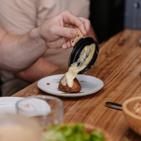 At ChouChou, raclette is served in a tiny fondue dish.