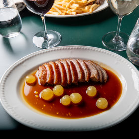 Roasted duck breast with pickled grape. 