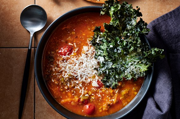 Take this comforting tomato and lentil soup to the next level with kale and parmesan crisps.