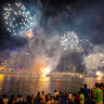 Night sky lights up for New Year's Eve as crowds flock to Brisbane River